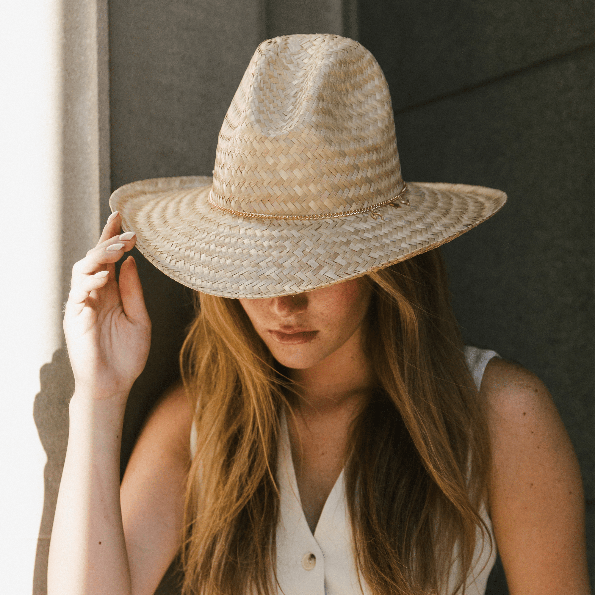 Gigi Pip limited edition hats for women - Limited Edition Hat 29 -  lightweight Mexican palmilla straw Western hat with a classic Gus crown + wide curve rolled brim at the base, featuring a gold plated metal Gigi Pip pin on the back of the crown + a gold chain trim strung with 3 western style charms [natural]