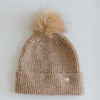 Gigi Pip beanies for kids - Milo Beanie - soft knit ribbers kid's beanie featuring a fold up brim with a rose gold Gigi Pip logo pin on the side of the fold and a pom pom on the center of the crown [camel]