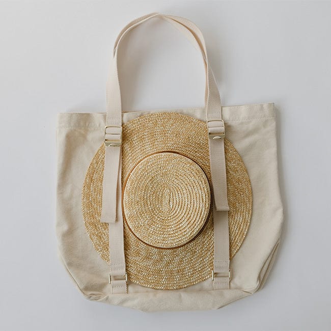 Gigi Pip hat carrying totes for women - Canvas Hat Carrying Tote - 100% organic cotton canvas with a genuine leather Gigi Pip branded detailing, featuring two adjustable straps to secure your hat to your tote [natural]