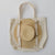 Gigi Pip hat carrying totes for women - Canvas Hat Carrying Tote - 100% organic cotton canvas with a genuine leather Gigi Pip branded detailing, featuring two adjustable straps to secure your hat to your tote [natural]