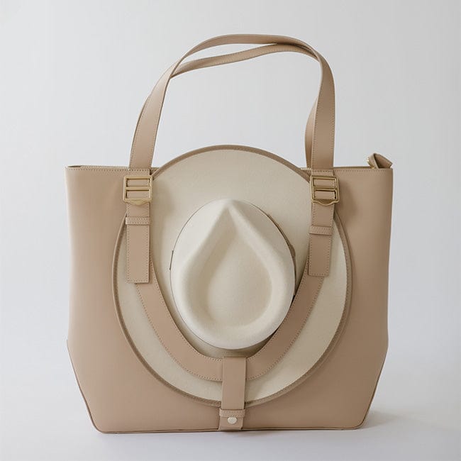 Gigi Pip hat carrying totes for women - Leather Hat Carrying Tote - 100% genuine leather hat carrying tote featuring a "U" strap to cradle your hat to your bag + two interior pockets [nude]