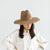Gigi Pip straw hats for women - Tessa Seagrass Fedora - fedora straw hat with monochromatic braided band, wide brim with frayed edges, handwoven seagrass straw lets just the right amount of sun in while offering plenty of ventilation and sun protection [brown]